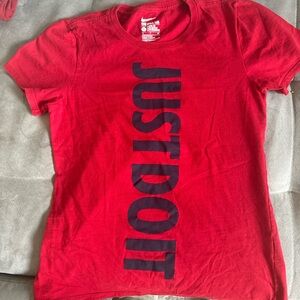 Nike drifit size small just do it short sleeve short in red. lightly worn